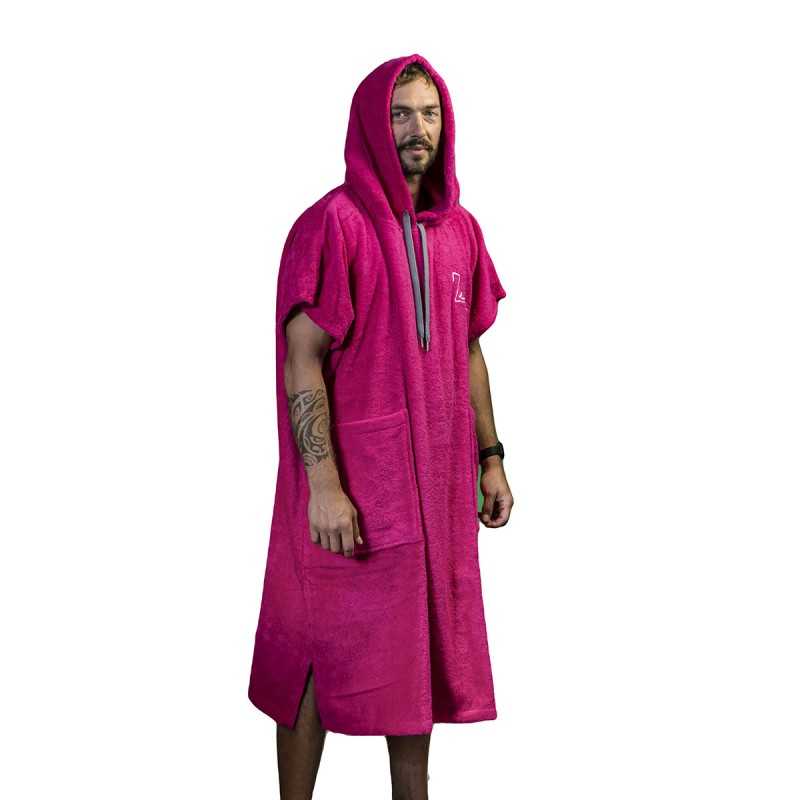 a man in a pink robe is standing